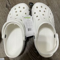 Crocs Baya Unisex Clog Sandals White Size Men’s 6,7 / Women’s 8,9 10126-100 Comfort Casual White Slip-on Mules, Comfortable White Clogs For Beach, Comfortable White Clogs For The Beach, Comfortable White Beach Clogs, White Non-slip Clogs For The Beach, White Non-slip Clogs For Beach, White Slip-resistant Sandals For Spring, Summer Synthetic Slip-resistant Clogs, Non-slip Open Toe Synthetic Clogs