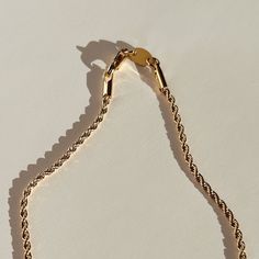 Our Adrian Rope Chain Necklace adds a touch of street style to any look. It is the perfect layering necklace to pair with other necklaces in your collection for an elevated look. The Adrian Rope Chain Necklace perfectly adds a touch of luxury to your style. Product Details: 2.3mm 18K Gold-Filled Rope Chain 16" & 18" Lengths Available Water-Wearable Made in Scottsdale, AZ Click here to buy an extender Model Specs: Model is wearing 16" Adrian in both on-body shots Rope Chain Necklace, Body Shots, Solid Gold Jewelry, Scottsdale Az, Layering Necklace, Gold Filled Jewelry, Rope Chain, High Quality Jewelry, Layered Necklaces