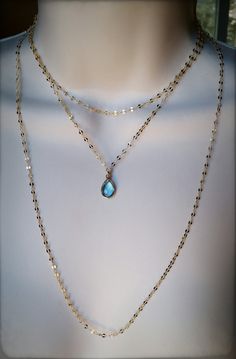 "This triple strand necklace that I designed for Stassi, is made of 18k heavy gold plated short flat shimmer chain. This necklace is all about the sparkle! The middle chain has a 9x6mm Bezel-ed Blue Topaz teardrop stone. The first \"top\" chain around the neck has several sizes available. Each size comes with an additional 1\" inch extension chain. *Stassi is wearing a 14\" inch in the photos above. **NICKEL FREE You also have a choice of different bezel gemstones: Green Quartz infused with copp Gold Faceted Multi-strand Jewelry, Gold Multi-strand Crystal Necklace, Gold Multi-strand Crystal Necklace As Gift, Vanderpump Rules, Green Quartz, Red Ruby, Multi Strand Necklace, Faceted Crystal, Strand Necklace