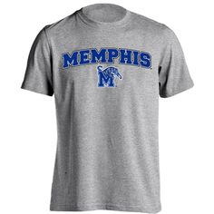 University of Memphis Arched Text with Mascot Short Sleeve T-Shirt This University of Memphis Tigers Shirt will no doubt be your go-to tee all season long not only in Memphis, Tennessee, but everywhere you go. Wear this tee with Pride and let everyone know your loyalty lies with The Tigers! Solids 100% Cotton Heathers Poly/Cotton Blend Full front high quality printed graphics Regular fit, cotton tee shirt is perfect to lounge around in or wear to the big game or tailgate party Officially License Casual Heather Grey Fan Merchandise Tops, College Heather Grey Tops With Letter Print, Heather Grey Letter Print Top For College, Heather Grey Graphic Print Top For College, Heather Grey T-shirt With Letter Print For Fans, Cotton Slogan T-shirt For Fan Gear, Heather Grey Crew Neck Fan Apparel Top, Heather Grey Crew Neck Top Fan Apparel, Heather Grey Letter Print T-shirt For Fans