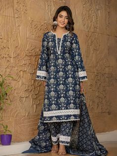 This 3-piece set includes blue cotton floral yoke print pakistani style, regular shape kurta has round neck, 3/4th sleeves, scalloped hem, calf length teamed with cotton printed trouser pants has elasticated waistband & slip on closure and a dupatta. The model wearing the size small is 5'8 in height. 3 Piece Set Color-Blue Kurta Fabric- Cotton Bottom Fabric - Cotton Dupatta Fabric-Voile Work - Floral Yoke Print detailing Neck - Round Neck Sleeves - 3/4th Sleeves Length-Calf Length Bottom - Printed Trouser Pants Bottom - Elasticated Waistband & Slip-on Closure Pocket - Single Pocket Washing Care-Machine Wash The model height 5'8 is wearing a size small Kurta Designs Women Casual, Plus Size Fashion For Women Indian, Dress Design Pakistani, Cotton Suit Designs, Printed Kurti Designs, Kurta Cotton, Pakistani Style, Latest Dress Design, Designer Kurti Patterns