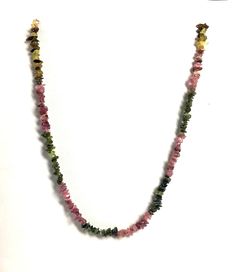 GEMSTONE NAME :- Multi Tourmaline  SHAPE :- Roundel  SIZE :- 3 MM to 4 MM approx..  LENGTH:- 17-18 Inch WEIGHT :- 316 Carats approx.. STRAND :- 1 strand necklace STYLE  :- Chips Shape Beads Necklace Packaging This stone will be sent in box ready for gifting yourself or someone else if you are purchasing this item as a gift I can an add a gift message and send it to your recipient on your behalf , just let me know at checkout Shipping I ship VIA USPS , DHL E-commerce,India Post and Tracking is included at no extra charge Current shipping time international shipment orders arrive within 14-20 days average, depending on customs in your country shipment could take longer .In its best colors, Iolite can rival the beauty of tanzanite but at a fraction of the cost. Strongly Iolite has been incorr Uncut Necklace, Chips Necklace, Necklace Packaging, Healing Necklace, India Post, Gift Message, Tourmaline Gemstone, Gemstone Healing, Beads Necklace