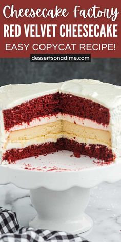 a red velvet cheesecake with white frosting on a cake plate