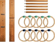 a set of wooden dows, two pairs of rubber rings and several pieces of rope