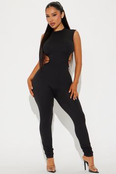 Available In Black. Jumpsuit Mock Neck Side Cut Outs Backless Hardware Detail Skinny Legs Stretch Inseam 30" 90% Polyester 10% Spandex Imported | Lola Babe Jumpsuit in Black size Large by Fashion Nova Black Athleisure Jumpsuit With Built-in Bra, Black Jumpsuits With Built-in Bra And High Stretch, Black Sleeveless Sporty Jumpsuit/romper, Fashion Nova Bodysuit, Fashion Nova Jumpsuits & Rompers, Men Jeans Pants, Jumpsuit Men, Leg Stretching, Jeans Jumpsuit