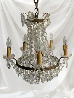 a chandelier with several lights hanging from it