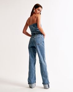 Elevate your wardrobe with the Abercrombie & Fitch Women's Strapless Denim Jumpsuit, a perfect blend of style and comfort. This piece is designed to flatter, crafted from a soft mix of cotton and elastane that ensures both flexibility and fit.

- **Size**: XXS Petite
- **Color**: Medium Wash
- **Material**: Body: Cotton, Elastane
- **Gender**: Female
- **Age Group**: Adult

Featuring a relaxed pant silhouette with a cuffed hem and contemporary seaming details, this jumpsuit offers a chic, strapl Casual Strapless Denim Jumpsuit With Pockets, Casual Medium Wash Strapless Denim Jumpsuit, Spring Denim Strapless Jumpsuit With Pockets, Denim Blue Strapless Denim Jumpsuit Overall, Casual Denim Strapless Jumpsuit With Pockets, Casual High Rise Strapless Denim Jumpsuit, Strapless Denim Jumpsuit With Pockets For Summer, Casual Strapless Denim Jumpsuit, Casual Medium Wash Fitted Strapless Jumpsuit