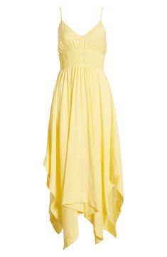 This midi-length sundress features a curve-hugging shirred bodice and a flowy handkerchief hem that sways as you walk. 36" center front length (size Medium) Slips on over head V-neck Adjustable straps Partially lined 82% viscose, 18% nylon Hand wash, dry flat Imported