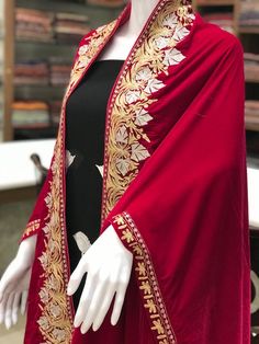 Complement your outfit with this Royal Velvet Cape. This is a very easy to style cape and it can be paired with any top, blouse, dress, or any other thing, no doubt you'll stand out from the crowd.Product DetailsCondition Brand New Velvet Cape with Golden & Silver Fusion Kashmir Zari Embroidery.Colour: RedSize: 82" X 35" (208.28 cms X 88.9 cms) approx.If you want a bigger or smaller size (dimensions), we can make it for you on order, just drop us a message.Care Instructions- Dry Clean Only.✿ Festive Cape Dupatta For Reception, Festive Reception Cape Dupatta, Festive Cape-shaped Dupatta With Resham Embroidery, Festive Cape Dupatta With Zari Work, Festive Cape Dupatta With Resham Embroidery, Festive Cape Shape Dupatta With Resham Embroidery, Festive Resham Embroidery Cape Dupatta, Intricate Embroidered Shawl For Wedding, Intricate Embroidered Wedding Shawl