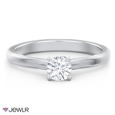 a white gold engagement ring with a round brilliant diamond