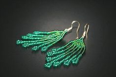 Emerald Boho Earrings Fringe Beaded Earrings Dangle Seed Elegant Green Jewelry With Tassels, Elegant Green Tassel Jewelry, Handmade Green Tassel Earrings For Gift, Elegant Green Dangle Beaded Earrings, Green Round Beaded Jewelry With Bead Caps, Green Dangling Bead Chandelier Earrings, Green Earrings With Tiny Beads, Green Tassel Drop Earrings As Gift, Elegant Green Dangle Tassel Earrings