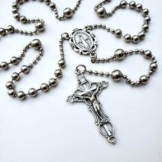 a rosary with an image of the crucifix on it