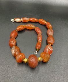 The Rare Unique PEMA RAKA Carnelian Amulet Prayer Beads Necklace From Himalayan Tibet The Age Of This Beads Are More than 1000 years Old As You Can See From Its Conditions Very Oily Smooth Skin Of This Pema Beads Some Gold Plated Wax and Gold Color Brass Beads Are Used As Spacers Rare Items For Collections Ancient Beads, Rare Beads, Antique Turquoise, Rare Items, 1000 Years, Brass Beads, Carnelian Beads, Amber Beads, Prayer Beads