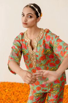 Welcome the new season with style and comfort, courtesy of our Green Floral Printed Muslin Co-Ord Set. Drawing inspiration from desi fashion, this chic set in a breezy green shade has all the makings of a luxurious outfit that will take you from brunch dates with friends to a day of shopping in total comfort. Crafted in muslin fabric, it'll be your go-to pick for effortlessly fashionable looks. No. of pieces : 2 piece set Color : Green Fabric : Muslin Top Length : 26-28 inches Pant Length : 38 i Brunch Dates, Muslin Fabric, Pant Length, Desi Fashion, Co Ord Set, Green Fabric, Co Ord, Indian Wear, Floral Printed