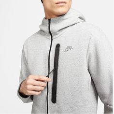 Men’s Nike 2 Separate Pieces Being Sold As A Set Jacket Full Zippered Hoodie - Smooth, Low Profile Fabric - Standard Fit - Front Pockets - 100% Sustainable Materials - Finished With Nike Grind Taping And Futura Logo Pants Slim Fit Tapered Leg Regular Length - Reflective Ticked Cotton Drawcord - Slashed Pockets 66% Cotton 34% Polyester Color May Differ Due To Lighting Sportswear Sweatshirt With Pockets For Outdoor Activities, Winter Tracksuit With Kangaroo Pocket, Fleece Moisture-wicking Tracksuit For Streetwear, Moisture-wicking Fleece Tracksuit For Streetwear, Sporty Fleece Tracksuit For Winter, Winter Fleece Tracksuit In Athleisure Style, Gray Tracksuit With Pockets For Sports, Sporty Winter Fleece Tracksuit, Sporty Hooded Winter Tracksuit