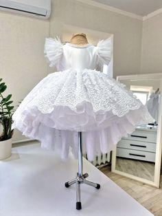 Elegant Princess Dress With Ruffles For First Communion, White Ruffled Princess Dress For First Communion, White Princess Dress With Ruffles For First Communion, First Communion Ball Gown With Ruffles, White Tulle First Communion Dress With Ruffles, Elegant Fitted Princess Dress For Baptism, White Princess Dress With Ruffles, Ruffled Ball Gown For First Communion And Wedding, White Short Sleeve Princess Dress For Party