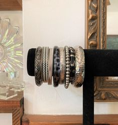 "8/ Stack of Bangles / Black & Silver/ Vintage Bangle Stack / Bangle Lot This stack of coordinated bangles measures almost 4\". Metal, brass, aluminum, and plastic. Via the late 80s and 90s. Wear them layered on a wrist or both or singly :) Note to self: 24 in dwn inv" Vintage Black Bangle Cuff Bracelet, Adjustable Black Bangle, Stackable Vintage Bangle, Black Metal Bohemian Cuff Bracelet, Black Stackable Bangle Bracelets, Bohemian Black Metal Cuff Bracelet, 90s Wear, Bangle Stack, Bracelets Vintage