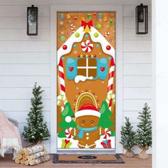 a decorated door with a gingerbread house on it