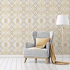 a chair and lamp in front of a wallpapered room with white flooring