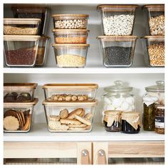 the shelves are filled with various containers and food items, including beans, cereals, nuts, and other things