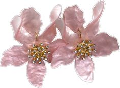 two pink flowers with gold accents on them