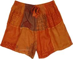 A fun pair of handmade cotton patchwork shorts, these soft cotton orange shorts with hippie prints are a perfect match for a day full of frolic! The summer shorts feature a pocket on either side for your essentials. It`s made of cotton fabric in a patchwork of slightly different shades of orange and is also lined with a soft cotton layer to give it some body. #tlb #bohemianfashion #Handmade #HippieShorts #BeachShorts Summer Orange Patchwork Bottoms, Brown Bohemian Shorts, Orange Cotton Patchwork Bottoms, Bohemian Brown Shorts For Summer, Brown Bohemian Shorts For Summer, Bohemian Patchwork Shorts, Bohemian Brown Shorts For Vacation, Bohemian Orange Cotton Bottoms, Orange Bohemian Cotton Bottoms