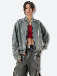 This Cyberpunk Zip-Up Denim Jacket offers a bold, industrial look with exposed seams and distressed detailing. Its oversized fit pairs perfectly with cargo pants or ripped jeans for versatile streetwear style. Cyberpunk aesthetic Denim material Zip closure at front Zip detail at sleeves Button detail at cuffs Tasseled detail Mandarin collar Long sleeve Cotton, polyester Our model wears L and is 5'4 (166cm) Aesthetic Patchwork, Style Cyberpunk, Cowgirl Clothes, Estilo Cyberpunk, Fall Sweaters For Women, Crop Pullover, Denim Hoodie, Jogger Pants Casual, Cardigan Sweater Vest