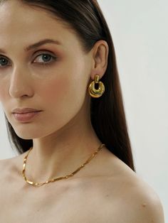 Make a statement with our Gold Circle Earrings. These chunky, geometric studs are a modern take on the classic round design. Crafted with a distinctive irregular finish, they're the epitome of contemporary elegance. Gold Circle Earrings, Geometric Studs, Gold Circle, Round Design, Circle Earrings, Classic Elegance, Geometric Design, My Jewellery, 18k Gold