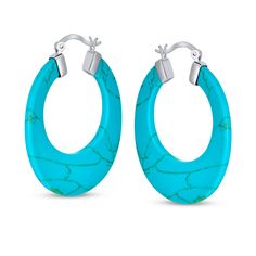 These Hoop Earrings will make you feel divine! These Hoop Earrings are made of .925 sterling silver. These hoop earrings feature an oval hoop design giving it unique sass. Perfect for Night or Day wear. These elegant hoop earrings will fit comfortably with the wearers ears. A snap post backing ensures maximum functionality without sacrificing style. For pierced ears only. Turquoise Hoop Pierced Earrings, Hypoallergenic Turquoise Oval Earrings, Modern Hypoallergenic Turquoise Earrings, Modern Turquoise Hypoallergenic Earrings, Modern Turquoise Hypoallergenic Jewelry, Turquoise Sterling Silver Hoop Earrings For Pierced Ears, Modern Oval Blue Earrings, Modern Blue Oval Earrings, Turquoise Sterling Silver Round Hoop Earrings