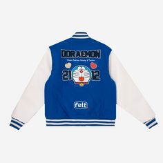 - Wool Varsity Jacket with Leather sleeves - Embroidery on front & back - Ribbed Cuffs - Snap enclosure - Embroidered Patches on sleeves - Woven Neck Label In Collaboration with Doraemon ©1970-2021 Fujiko Pro Spring Embroidered Cotton Varsity Jacket, Embroidered Long Sleeve Varsity Jacket For College, Blue Long Sleeve Outerwear With Embroidered Graphics, Embroidered Fitted Outerwear For College, White Embroidered Patch Long Sleeve Outerwear, White Long Sleeve Outerwear With Embroidered Patch, Blue Outerwear With Embroidered Logo For College, Blue Outerwear With Embroidered Patch For Fall, Fall Blue Outerwear With Embroidered Patch