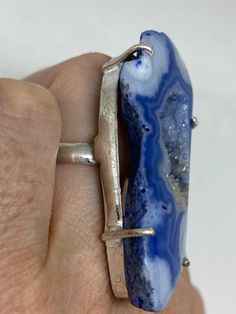 great color blue Lace agate stone The setting is handcrafted in low content silver About 2 inch long Size 6.5 Can be sized. My jeweler charges between $10-$15. All rings are shipped free in the US in a nice gift box. Check out our over a THOUSAND great reviews Engraving is $4 per letter and is not always perfect depending on the piece. It can take a few days if the jeweler is busy. This is payable to Paypal Judithsltd@gmail.com Handmade Blue Agate Rings, Handmade Blue Geodes As Gifts, Handmade Blue Geodes For Gifts, Handmade Blue Geodes For Gift, Handmade Blue Geodes As A Gift, Lace Agate Stone, Blue Lace Agate, Lace Agate, Agate Stone