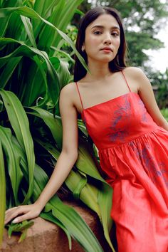 Red tiered handwoven mulberry 
silk strappy midi dress, detailed 
with small metallic beads and 
contrast pomegranate blue motif 
embroidery. 
Components: 1
Pattern: Embroidery
Type Of Work: Pomogrenate
Neckline: Square Neck
Sleeve Type: Sleeveless
Fabric: Handwoven Mulberry Silk
Color: Red
Other Details: 
Side pockets
Occasion: Resort - Aza Fashions Serena Dress, Motif Embroidery, Strappy Midi Dress, Pattern Embroidery, Silk Embroidery, Fashion App, Mulberry Silk, Dress For Women, Aza Fashion