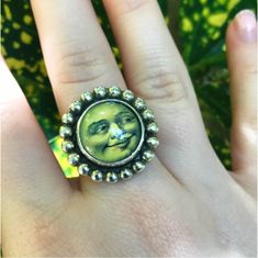 This moon ring is a definite statement piece! The ring features a solid sterling silver double 16 gage band with a 12mm glass cabochon Handmade by Old Hippie Dave in Safety Harbor, Florida. Each one is hand fabricated out of 925 sterling silver and hand polished. Unique Adjustable Jewelry With Moon Phase, Vintage Sterling Silver Moon Phase Jewelry, Vintage Sterling Silver Moon Jewelry, Vintage Moon Shaped Sterling Silver Jewelry, Vintage Moon-shaped Sterling Silver Jewelry, One-of-a-kind Artsy Sterling Silver Jewelry, Artsy One-of-a-kind Sterling Silver Jewelry, Nickel Free Moon Shaped Rings As Gift, Vintage Moon Shaped Rings As Gift