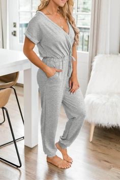 Cross V-neck Short Sleeve Jumpsuit V-neck Jumpsuits And Rompers With Pockets For Work, Gray Fitted V-neck Jumpsuits And Rompers, Trendy V-neck Jumpsuits And Rompers For Summer, Trendy Summer V-neck Jumpsuits And Rompers, Chic Fitted V-neck Jumpsuits And Rompers, Elegant V-neck Jumpsuits And Rompers With Tie Waist, Gray Jumpsuits And Rompers For Spring, Gray Solid Color Jumpsuit For Spring, Spring Gray Solid Color Jumpsuit