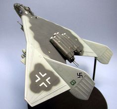 a model fighter jet sitting on top of a table