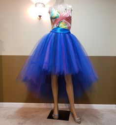 "I CAN MAKE THIS TUTU IN ANY COLOR AND SIZE, PLEASE NOTE THE EXACT TULLE AND RIBBON COLOR AT CHECK OUT (Without note I will make it same color with 1st list photo in royal blue purple & navy). 1ST PHOTO TUTU LENGTH FRONT 22'' above KNEE LENGTH, BACK 44'' ankle LENGTH, FOR HEIGHT AROUND 5'7'' wear a couple inches of heels . This tutu is made with 250-500 yards of 6'' wide fine tulle so it's super full. Stretchy waist along with a big ribbon bow ties on the waist. (I might use 2''or 1.5'' ribbon depends on which one is in stock.) Sew in lining, the tulle will stay nice and not see through. List photo black tutu front is 16'' above the knee length, back is 44'' full length. Layered cut. The rest photos are fairy angled cut. You will love your tutu once you put it on! TAKING MEASUREMENTS: WAIS Fitted Tulle Tutu Dress For Prom, Party Tulle Pleated Skirt, Spring Costume Party Fitted Tutu Dress, Fitted Tutu Dress For Spring Costume Party, Summer Costume Party Tulle Petticoat, Party Season Tulle Skirt, Summer Tulle Petticoat For Costume Party, Spring Costume Party Tutu Dress With Tulle Skirt, Fitted Purple Tutu Dress For Spring