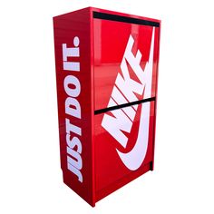 a red nike mini fridge with the word just do it on it's side