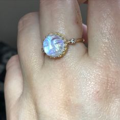 Please go to my Instagram to watch the video about this ring~ PRODUCT VIDEO ⇒ https://goo.gl/tkrFcq Like a little moon glowing In the sky. This stunning Man face rainbow moonstone dances with iridescence like you wouldn't believe. Such an elegant piece and with so much character. Perfect from day to night. Each piece of rainbow moonstone was hand carved, it's unique and charm. This listing is for one piece of rainbow moonstone ring only. Also available other stones, please see last photo. Gem: 1 Yellow Gold Moonstone Jewelry, Unique Yellow Gold Moonstone Jewelry, Unique Yellow Gold Moonstone Ring, Handmade Fine Jewelry Yellow Gold Moonstone Ring, Handmade Yellow Gold Moonstone Ring Fine Jewelry, Handmade Yellow Gold Moonstone Ring, Unique 14k Gold Moonstone Ring Gift, Celestial Moonstone Jewelry In Yellow Gold, Celestial Moonstone Yellow Gold Jewelry