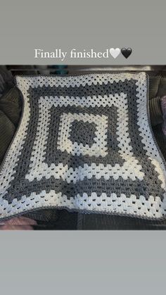 a crocheted afghan is shown with the words finally finished written in black and white