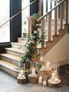 candles and flowers are arranged on the steps