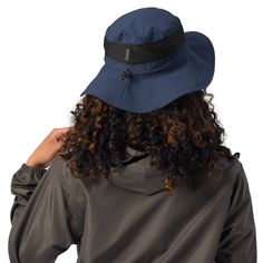 Stay comfortable and protected when fishing, hiking, or gardening. This Columbia hat features a high-tech sweatband, mesh vents, and wide brims made from a special fabric, all designed to keep you cool in the sun. * 100% textured nylon poplin top, sides and brim * Omni-Shade™ UPF 50 protection * Omni-Wick™ moisture-management sweatband and mesh vents * 3-inch brim * Adjustable drawcord and toggle at the back * Embroidered Columbia logo on the front This product is made especially for you as soon as you place an order, which is why it takes us a bit longer to deliver it to you. Making products on demand instead of in bulk helps reduce overproduction, so thank you for making thoughtful purchasing decisions! Outdoor Bucket Hat With Upf 50+ And Wide Brim, Outdoor Wide Brim Bucket Hat With Upf 50+, Waterproof Brimmed Hat For Outdoor, Outdoor Wide Brim Bucket Hat Upf 50+, Outdoor Waterproof Brimmed Hat, Adjustable Brimmed Bucket Hat For Outdoor Activities, Upf 50+ Bucket Hat With Short Brim For Hiking, Upf 50+ Bucket Hat For Outdoor Activities, Upf 50+ Short Brim Bucket Hat For Hiking