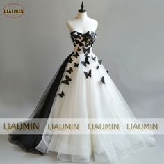 White And Black Ball Gown, Gothic Wedding Dress Black And White, Black Sweetheart Neckline Ball Gown For Wedding, Black Wedding Gown With Sweetheart Neckline, Black Wedding Gown With Detachable Train, Black Strapless Ball Gown For Wedding, Black Wedding Dress With Fitted Bodice, Black Fitted Dress For Ceremony, Black Prom Dress Inspiration