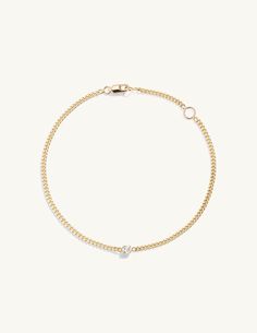 Details This solid 14k bracelet has a prong-set 3mm diamond on a flat curb chain with a lobster clasp closure. Measurements Small - 6" with a loop at 5" Medium - 7" with a loop at 6" Large - 8" with a loop at 7" Chain Width: 1.8mm Carat Weight: 0.10 Shipping Each piece of jewelry is carefully hand fabricated in our NYC studio so please allow 2-3 weeks for delivery. If you would like to request a rush order please contact the studio at sophie@sophieratner.com. Selecting faster shipping options wi Elegant Diamond Cuban Link Bracelet With Curb Chain, Elegant Diamond Bracelet With Curb Chain, Elegant 14k Gold Diamond Bracelet With Curb Chain, Classic Oval Link Diamond Chain Bracelet, Classic Diamond Oval Link Chain Bracelet, Elegant Diamond Chain Bracelet With Curb Chain, Classic Oval Link Chain Bracelet With Diamond Accents, Elegant Diamond Curb Chain Bracelet, Modern Diamond Jewelry With Box Chain