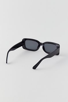 UO essential rectangle sunglasses. A simple classic, these rectangle sunglasses are a must-have. Chunky plastic frames with a rectangle lens complete with UV protection. Features UO essential rectangle sunglasses Simple classic rectangle sunglasses Made in part with recycled materials UV 400 protection Content + Care 60% Recycled post-consumer polycarbonate, 36% polycarbonate, 4% copper Wipe clean Imported Size Temple: 140mm Lens: 50.5mm Bridge: 21.5mm | Urban Outfitters UO Essential Rectangle S Black Rectangle, Rectangle Sunglasses, Recycled Materials, Uv Protection, Cleaning Wipes, Urban Outfitters, Temple, Bridge, Sign Up