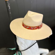 Tan colored wool pinch front western hat, paisley hat band included. 100% Wool. Made by M&F Western- Twister Hats Be sure to look for all our hat accessories! We have hat pins, bands, feathers, and more! Crown diameter measurements: Medium- 22", Large - 23", XL - 24" Western Hat, Hat Accessories, Western Hats, M F, Hat Band, Hat Pins, Tan Color, Feathers, To Look