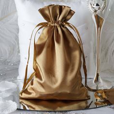 "View All Colors: https://etsy.me/3Z1JIbC Quantity: 12 Satin Bags Material: Satin Color: Antique Gold Bag Size: 6\" x 9\" Fillable Size: 6\" x 7.5\" Perfect for packaging jewelry or candies. Satin style with shiny finish. Does not have a flat bottom. Drawstring Pouch These satin party favor bags have a glamorous gloss that is so eye-catching; just fill these candy bags with delectable favors like chocolates, candies, nuts or sweet knick-knacks for the delight of your guests. You can even use the Wedding Party Gift Bags, Wedding Favor Gift Bags, Handmade Candy, Handmade Wedding Favours, Wedding Gift Bags, Gold Bag, Satin Bags, Wedding Favor Bags, Party Gift Bags