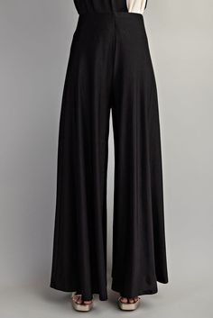 slinky super wide high waist pants Brand: Glam Style: GP7923 Fabric: 90%POLYESTER 10%SPANDEX Details: SS24 High Waist Wide Knit PantsMODEL HEIGHT 5'7" Made in China Black Flare Wide Leg Pants For Night Out, Solid Color Wide Leg Pants For Night Out, Solid High-waisted Wide Leg Pants For Night Out, Chic Stretch Wide Leg Culottes, Wide Leg High-waisted Pants For Night Out, Versatile Black Bottoms For Evening, Solid Wide Leg Pants For Night Out, Versatile Black Evening Bottoms, Chic High Waist Wide Leg Pants With Wide Waistband