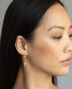 This hoop cross earring is made of solid gold and features a 9.5mm long chain, finished with signature Rockford screw designs. Elevate any look with this premium dangle cross earring. Yellow Gold Cross Earrings For Pierced Ears, Dangle Cross Earrings, Earring For Men, Cross Earring, Pinky Signet Ring, Black Diamond Bands, Comfort Fit Wedding Band, Black Diamond Ring, Wide Rings