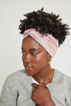 Wrap it and love it. What it is: A stylish all-satin wrap headband with an extra wide back to protect your updos and delicate edges. Why it's special: all-satin construction - ready-to-wear twist design non-absorbing fabric redistributes hair's natural oils for healthier curls gentle on your delicate edges wide back protects your hair against headrests Good to know: Machine wash cold and tumble dry on low. 96% Polyester 4% Spandex Headwrap Hairstyles, Wrap Headband, Roller Skaters, Natural Hair Oils, Black Hair Care, Hair Wraps, Natural Oils, Wrap Style, Black Hair