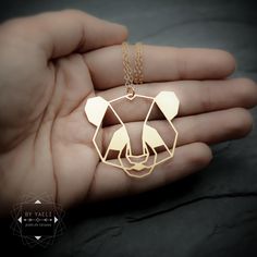 "This modern gold panda bear necklace is the ultimate jewelry piece to show off your love of animals while staying in style on trend. this geometric Japanese style necklace is bound to become a staple in your jewelry box. ★This is the gold item, for the silver item use this link: https://www.etsy.com/listing/727102387 ★ Comes in our signature gift box, ready for gift giving. ★ Available in Gold [18k Gold filled chain & 18k gold plated brass pendant] ★ Pendant size is 1.50\"x1.50\" (38 x 38mm Necklace Japanese, Panda Necklace, Jewelry Design Studio, Japanese Jewelry, Gold Leaf Necklace, Panda Gifts, Nature Necklace, Bear Necklace, Gold Charm Necklace